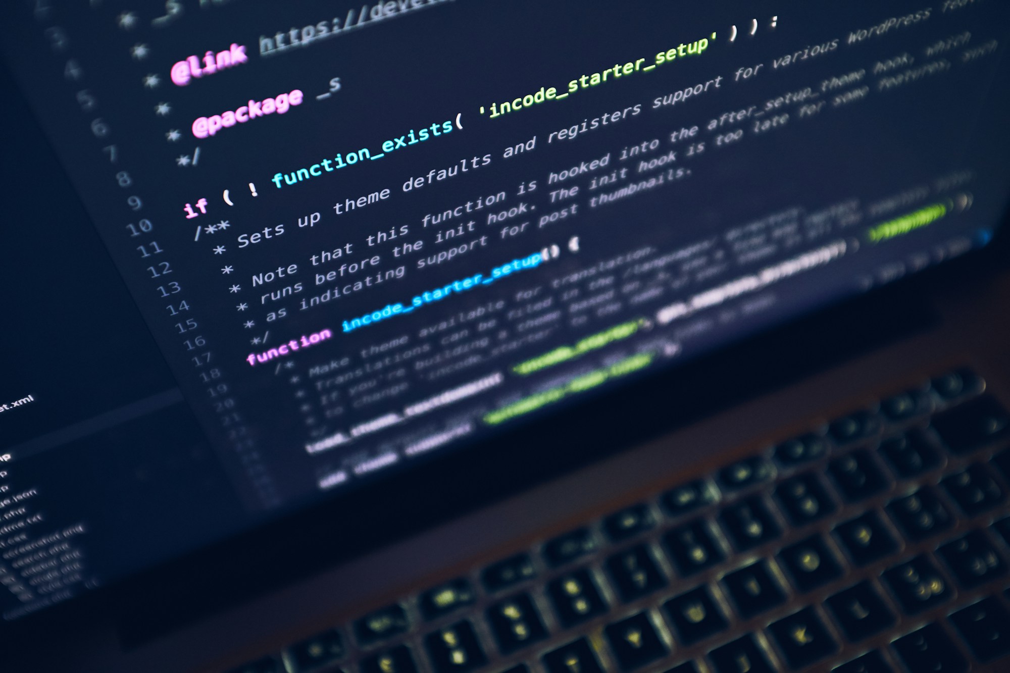 Code on a laptop screen during website development and maintenance